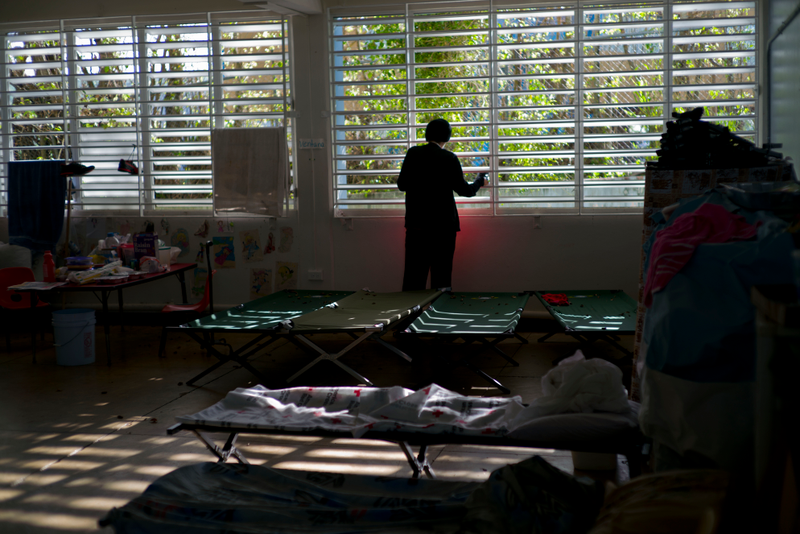 Many Puerto Ricans, like this teenage boy in a school-turned-shelter, were left homeless by Hurricane Maria. Photo: AP